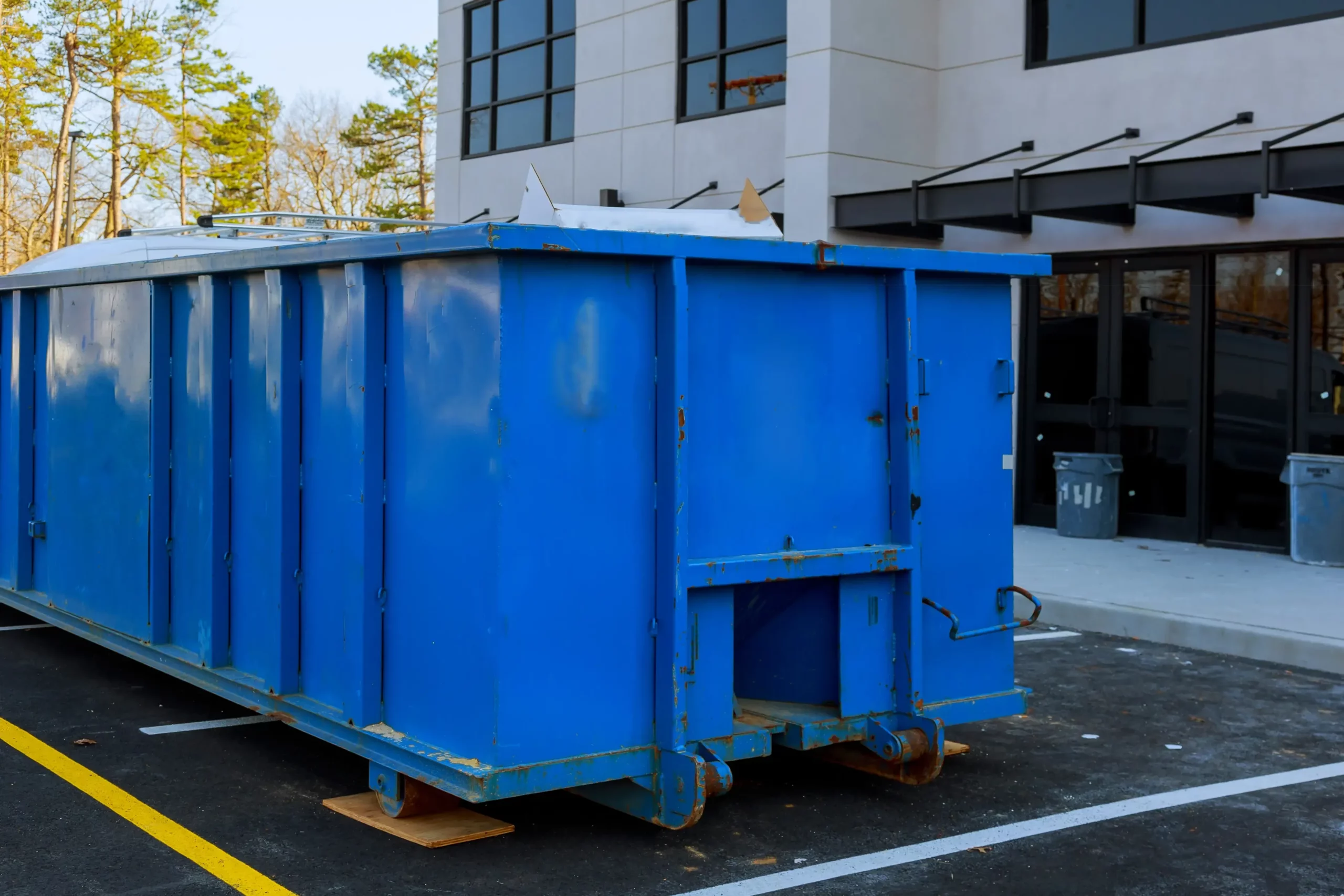 Waste Falcon Commercial Dumpster Rental near warehouse
